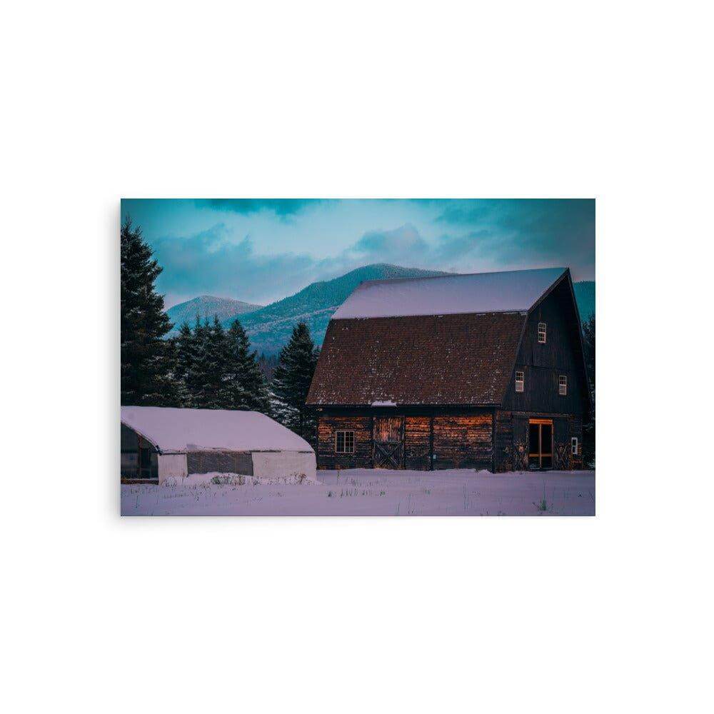 Adirondack Mountain High poster with partly glossy and matte finish, featuring a rustic barn in a snowy landscape with mountains in the background.