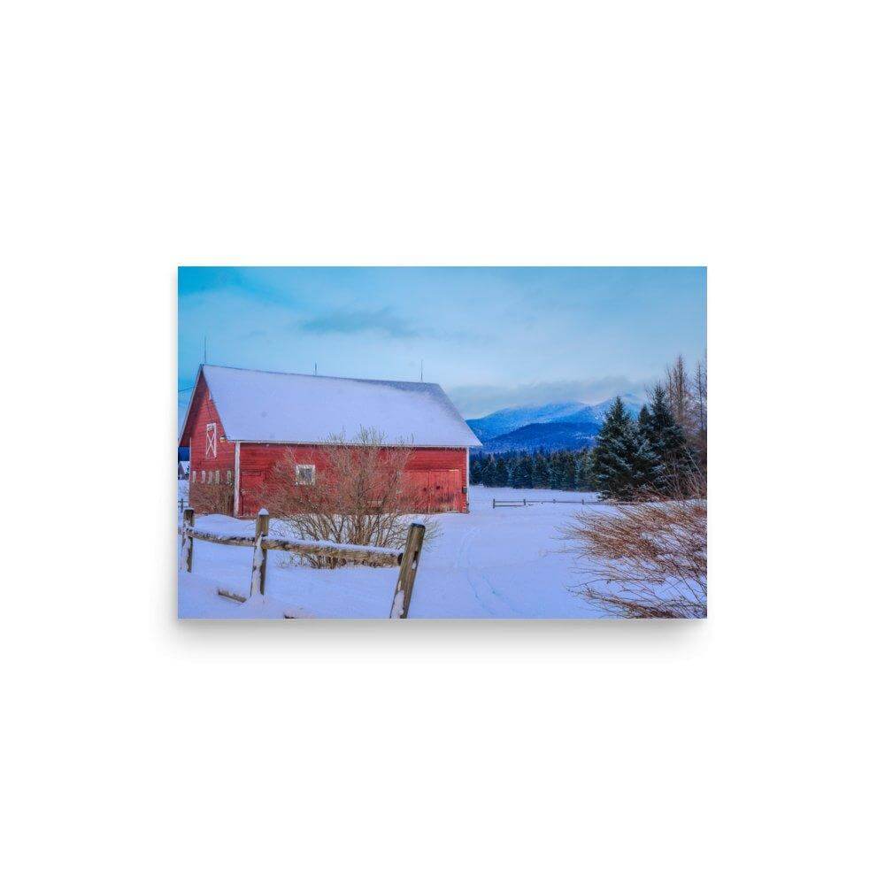 Poster of a red barn in a snowy mountain farm with trees and a fence, featuring a partly glossy, partly matte finish.